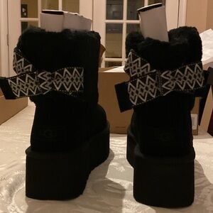 UGG Women's Black Boots with Geometric Bow Classic Mini Maxi